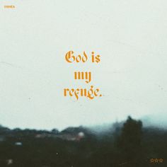 the words god is my refuge are written in orange on a blurry background with trees