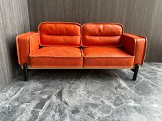 Description: Introducing our exquisite 1:6 scale dollhouse sofa, designed to add a touch of elegance to your miniature world. Handcrafted with meticulous care, this miniature sofa replicates the craftsmanship and comfort of a full-size adult sofa.  Constructed with a sturdy solid wood frame, this dollhouse sofa features a stylish Orange wax suede upholstery, exuding a luxurious and refined aesthetic. The sandblasted suede material lends a velvety texture to the piece, creating a cozy and invitin Miniature Sofa, Sofa Handmade, Refined Aesthetic, White Wax, 1 6 Scale, Leather Couch, Hand Crafted Furniture, Coffee Colour, Suede Material