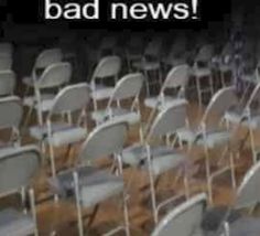 rows of white chairs sitting next to each other in front of a black background with the words bad news on it