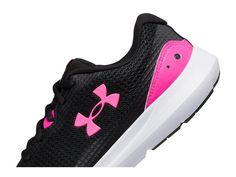 Look sporty and stylish wearing the Under Armour® Surge 3 Shoes..Textile and synthetic upper..Textile lining and insole..Lightweight and breathable..Round toe silhouette..Lace-up closure..Synthetic outsole..Imported..Double button pull through stud closure. Under Armour Sneakers, 3 Shoes, Casual Sneakers Women, Pull Through, Sneaker Collection, Sportswear Women, Personal Shopping, Women's Sneakers, Casual Sneakers