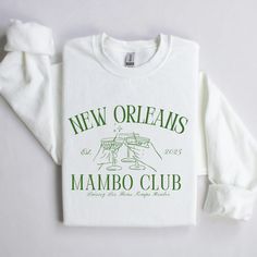 Celebrate Mardi Gras in true preppy style with this cozy, yet effortlessly chic unisex crewneck sweatshirt. Perfect for layering on those cooler days for parades, this sweatshirt is crafted from a luxe blend of 50% cotton and 50% polyester, offering both comfort and durability. The classic fit, ribbed knit collar, and crew neckline give it a polished look, while the medium-heavy fabric ensures you stay snug whether you're enjoying the festivities or relaxing with friends. Say goodbye to itchy se Louisiana Mardi Gras, Mardi Gras Outfits, Mardi Gras Shirt, Club Sweatshirts, Preppy Look, Mambo, Knit Collar, Polished Look, Preppy Style