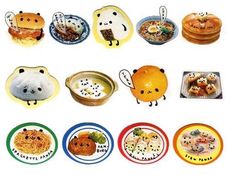 there are many plates with different foods on them and one has a panda face in the middle