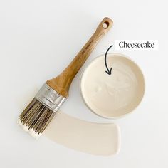 a paintbrush and bowl with the words cheesecake on it next to an image of a wooden brush