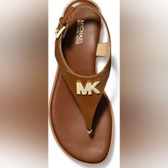 Mk Brady Lugguage Sandal Size 10 Spring Round Toe Sandals With Logo, Leather Sandals With Logo For Spring, Spring Leather Sandals With Logo, Michael Kors Brown Leather Sandals, Michael Kors Ankle Strap Sandals With Branded Insole, Michael Kors Synthetic Sandals With Branded Insole, Michael Kors Leather Sandals With Cushioned Footbed, Michael Kors Brown Sandals With Branded Heel, Michael Kors Flat Sandals