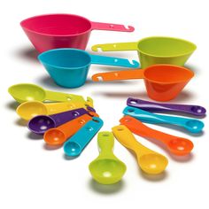 colorful plastic measuring cups and spoons arranged in a circle