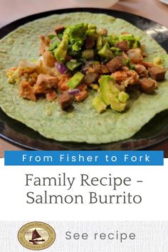 a tortilla with meat and vegetables on it sitting on top of a plate