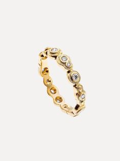 a gold ring with diamonds on it