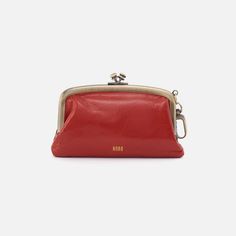 Add a touch of personality to any bag or keychain by layering on our Cheer bag charm, perfect for holding your AirPods and small essentials. Cheer Frame Pouch In Polished Leather  Brick CLIP ACCESSORY in Brick | Hobo® Rectangular Travel Pouch With Key Clip, Travel Coin Purse With Key Clip, Elegant Handheld Wallets For Everyday Use, Everyday Use Coin Purse With Key Clip, Modern Coin Purse With Key Clip For Daily Use, Modern Coin Purse With Key Clip, Trendy Daily Use Pouch With Interior Key Chain Holder, Versatile Travel Coin Purse With Key Clip, Daily Use Wallets With Key Clip And Pouch Shape