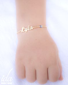 Custom name bracelet with your desired name and evil eye. A unique personalized baby shower gift, or unique gift for kids... .We handmade each piece with care and love ♡ ★ PRODUCT DETAILS; Size Options: Available in BABY SIZE, ADULT SIZE, KIDS SIZE (please select from the menu) *Material Options: 925k Sterling Silver & Rose Gold Filled Over Silver & Yellow Gold Filled Over Silver ★ HOW TO PLACE YOUR ORDER; *Please select your desired material from the menu while adding to card. *Please w Cute Name Bracelets For Birthday Gift, Cute Custom Name Bracelet For Personalized Gift, Cute Handmade Name Bracelet For Personalized Gift, Cute Personalized Name Bracelet As Gift, Cute Personalized Name Bracelet Gift, Cute Personalized Name Bracelet For Gift, Cute Personalized Name Bracelet For Gifts, Cute Custom Name Bracelet For Gift, Nameplate Bracelet With Names As Gift