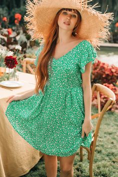 Our Green Ditsy V-Neck Flutter Sleeve Mini Dress features a lively pattern that’s perfect for any casual occasion. The flutter sleeves add a touch of whimsy, while the V-neckline offers a flattering look. This charming mini dress is ideal for spring picnics or sunny days out. Product code: CAA05A4D180PP Features:  Woven V-neckline Flutter sleeves Mini Pattern: Floral Wash Method: Regular Wash Material: 100%RAYON. Casual Dress With Butterfly Sleeves For Garden Party, Green Butterfly Sleeve Summer Dress, Green Butterfly Sleeve Dress For Spring, Green Spring Dresses With Butterfly Sleeves, Casual Printed Dress With Flutter Sleeves, Ditsy Floral Print Flutter Sleeve Dress For Vacation, Ditsy Floral Print Dress With Flutter Sleeves For Vacation, Flutter Sleeve Dresses With Ditsy Floral Print For Vacation, Summer Dresses With Ditsy Floral Print And Flutter Sleeves