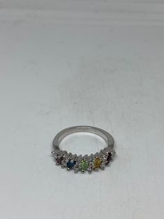 Lovely and delicate Bohemian ring 925 Sterling silver Deco ring set with genuine citrine, amethyst peridot, garnet and blue topaz Size 8 but can be re sized for you on request by laser. My jeweler charges $10-$20 All rings are shipped in a nice gift box. Check out our over a THOUSAND great reviews Engraving is $4 per letter and is not always perfect depending on the piece. It can take a few days if the jeweler is busy. This is payable to Paypal Judithsltd@gmail.com Silver Multi-stone Stackable Rings As A Gift, Silver Multi-stone Open Diamond Ring, Silver Multi-stone Diamond Promise Ring, Silver Multi-stone Diamond Ring For Promise, Silver Cubic Zirconia Crystal Ring With Multi-stones, Silver Multi-stone Stackable Rings In Fine Jewelry Style, Silver Multi-stone Stackable Rings Fine Jewelry, Silver Stackable Rings With Multi-stones In Fine Jewelry Style, Silver Stackable Rings With Multi-stone