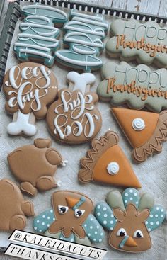 some decorated cookies are sitting on a table