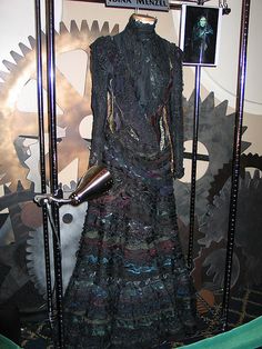 a dress made out of metal gears on display