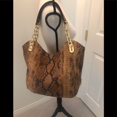 Brand New With Tags!! Snakeskin Handbag With Gold Chain Detail, Never Worn. Adorable In Person!! Measures Approximately 16w X 13l X 5deep With Handle Drop Around 10” And It Has 5 Pockets On The Inside.Comes With Its Dust Bag. I Only Sell Good Quality Items So No Low Ball Offers, Please-Thank You! Luxury Michael Kors Shoulder Bag With Large Capacity, Luxury Large Capacity Michael Kors Shoulder Bag, Michael Kors Gold Shoulder Bag For Everyday Use, Michael Kors Gold Shoulder Bag With Handles, Michael Kors Gold Leather Shoulder Bag, Michael Kors Gold Double Handle Shoulder Bag, Gold Michael Kors Shoulder Bag With Double Handle, Gold Michael Kors Shoulder Bag For Everyday, Michael Kors Brown Bucket Bag