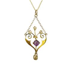 Exquisite Edwardian, 9ct, 9k, 375 gold Amethyst and Pearl lavalier necklace on chain, C1905 Beautifully made in 9ct gold during the Edwardian, Art Nouveau period.  This antique pendant features a central 5mm faceted Amethyst mounted in the centre of an abstract gold heart frame decorated with three seed pearls,  the pendant is connected with two lengths of chain to a central ring (we have teamed this pendant with a new 9ct rolo link chain). Complete with caged pearl drop suspended from the base Gold Art Nouveau Necklace With Gemstone, Art Nouveau Gold Necklace With Gemstone, Vintage Gold Briolette Necklace, Art Nouveau Yellow Gold Gemstone Necklaces, Victorian Birthstone Necklaces For Anniversary, Victorian Birthstone Necklace For Anniversary, Antique Birthstone Necklace For Wedding, Vintage Birthstone Necklace For Formal Occasions, 14k Gold Art Nouveau Pendant Necklace