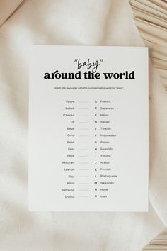 the baby's around the world game is shown on top of a white sheet