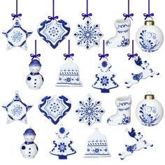 christmas ornaments are hanging from blue and white ribbons on the tree ornament set