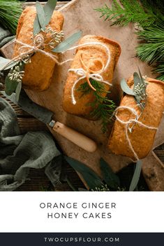 two slices of bread tied with twine and surrounded by greenery on a cutting board