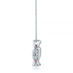 101978 14k White Gold Pendant   White Opal   4 Rubies   21 Diamonds - .30 ctw   Clarity: SI1 - Color: I   14k White Gold Wheat Chain 18"   Galatea. This stunning pendant features a diamond prong set in the center, poised atop a white opal, all of which stands straight up in the middle of a concave section of polished white gold. The margins of the piece are bright cut set with diamond accents, and bezel set rubies are integrated into the elegant filigree on the sides of the pendant body.      It’s a selection from the Illusia Collection by Galatea that we carry here at Joseph Jewelry, and you can stop by our Bellevue, WA showroom any time to view this and other similar pieces in person. Joseph Jewelry has a long-standing partnership with Galatea, and we’re proud to offer their unique and c Platinum Diamond Necklace With Pave Setting As Gift, Platinum Necklace With Pave Setting As Gift, Platinum Jewelry With Pave Setting As Gift, White Gold Pendant, White Opal, Bezel Setting, Diamond Pendant, Gold Pendant, Prong Setting