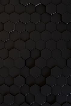 an abstract black background with hexagonal shapes