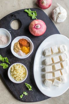 the ingredients for this meal include tofu, onions and garlic