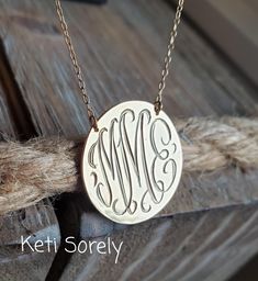 "Monogram initials disc necklace from solid gold. Order your initials and it will be hand engraved in beautiful script font. Amazing personalized gift for any occasion: wedding, birthday, graduation, Christmas.  Designs by Keti Sorely Made in USA.   Metal options: * 10K (Yellow, Rose or White) * 14K (Yellow, Rose or White) * 18K (Yellow, Rose or White) Choose disc size between 1/2\" to 1.5\" Comes on 18\" chain (please email us if you would like a shorter chain). Model is wearing a 3/4\" monogra