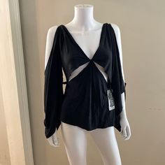 Such An Amazing Find! This Black Silk Top By Tom Ford For Gucci Is From The Fall/Winter 2002 Collection. It Was Seen Both On The Runway And In Ad Campaigns. This Blouse Still Has The Original Tags Attached! It Has Been Stored In A Climate Controlled Environment For 20 Years. The Top Is Draped, Backless And Fabulous! Italian 44/Us 8 If You Have Any Questions Questions Regarding This Listing Please Message Me. Gucci Black Tops For Spring, Gucci Black Top For Night Out, Gucci Long Sleeve Evening Tops, Gucci Evening Long Sleeve Tops, Gucci Black Top For Spring, Designer Black Top For Evening, Designer Black Tops For Night Out, Black Gucci Top For Party, Luxury Black Evening Tops