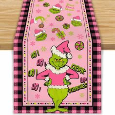 the grinch christmas table runner is on display