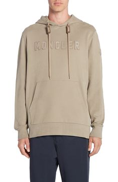 The label known for its impeccable outerwear adopts a more-lightweight approach with an all-cotton hoodie finished with a leather logo stitched to the chest. Drawstring hood Kangaroo pocket Ribbed cuffs and hem 100% cotton with leather contrast Dry clean Imported Designer Clothing Luxury Long Sleeve Hoodie With Ribbed Cuffs, Luxury Cotton Hoodie Sweatshirt, Luxury Hoodie Sweatshirt, Luxury Long Sleeve Hoodie For Fall, Luxury Sweatshirt With Drawstring Hood, Luxury Logo Detail Sweatshirt For Winter, Luxury Hooded Sweatshirt With Ribbed Cuffs, Luxury Cotton Hoodie With Ribbed Cuffs, Luxury Cotton Sweatshirt With Logo