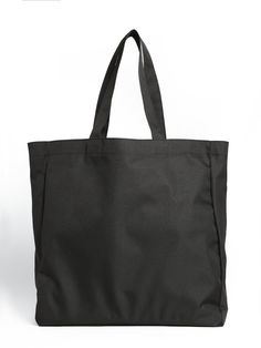 This multi-purpose tote is designed to hold all your daily essentials. It features a laptop-sized slip compartment, a swivel hook for key fobs, and plenty of pocket space. Built from tough poly-nylon that's lightweight and packable, it's the perfect travel and shopping companion. #B1911704-82822 100% Polyester 16.5'' W x 16.5'' H x 5'' D Handle Drop: 22'' Black Nylon Bag For Everyday Use, Large Functional Everyday Bags, Black Tote Bag For Commuting, Large Functional Bags For Daily Use, Large Functional Daily Use Bags, Nylon Canvas Bag For Everyday Use, Nylon Tote Bag For Everyday Use, Nylon Bags With Reinforced Handles For Everyday Use, Functional Canvas Tote Bag With Top Carry Handle