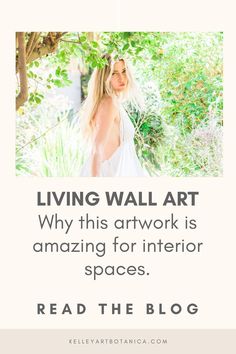 a woman standing under a tree with the words living wall art why this artwork is amazing for