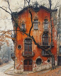 an old building with lots of windows and balconies on the side of it