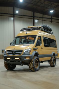 a yellow mercedes benz bus parked in a garage