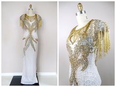 "This is a GORGEOUS gown heavily embellished with sequins, pearls and glass beading. It's in excellent condition! Measurements: Bust - 32\" Waist - 26\" Hips - 36\" Length - 60\" Tag Size - Small This dress comes from a pet-free and smoke-free home. If you would like more info or have any questions, please don't hesitate to ask!" White Embellished Evening Dress For Reception, Glamorous Beaded Wedding Evening Dress, Hand Embellished White Party Gown, Elegant Silver Dress With Pearl Embroidery, White Hand Embellished Fitted Gown, Hand Embellished Silver Bollywood Gown, Fitted White Beaded Evening Dress, White Fitted Beaded Evening Dress, White Beaded Fitted Evening Dress