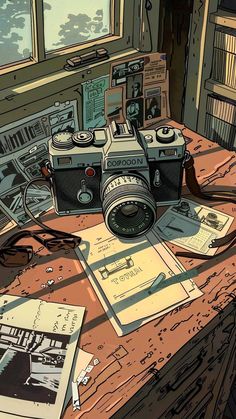 an old photo camera sitting on top of a wooden table next to books and papers