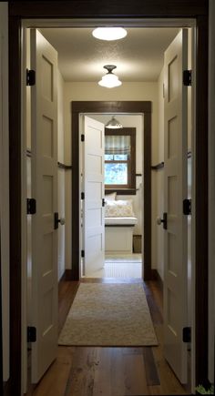 an open door leading into a hallway with the words, interior and external wooden doors