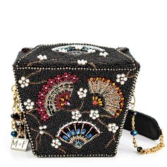 PRICES MAY VARY. Unique and Luxurious Design: The Mary Frances Fanfare Handbag is a bold and luxurious accessory inspired by a take-out container. It features blossoming embroidered branches and multiple dancing fans, adorned with sparkling bead and pearl embellishments, creating a true statement piece. Versatile Wear Options: With a removable padded shoulder chain strap that converts to a top handle, this handbag offers two-way wear for added versatility and convenience. Secure Closure: Equippe Black Rectangular Shoulder Bag For Festivals, Black Embroidered Shoulder Bag For Festivals, Embellished Black Bags For Festivals, Black Embellished Bags For Festivals, Elegant Black Bags For Festivals, Black Evening Bags For Festivals, Mary Frances Bags, Mary Frances Handbags, Shoulder Piece