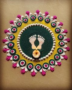 a hand made decoration with feet and circles