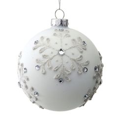 a white christmas ornament hanging from a string