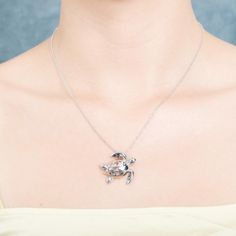 This 925 sterling silver sea turtle pendant features our original Honu motif paired with a hibiscus cut-out design and topaz gemstones. Hawaii’s Honu, or sea turtles, are one of the Aumakua, or deified ancestors, known to unite heaven and earth while they symbolize endurance and wisdom. Wear our Paradise Honu pendant for good fortune and life longevity. In Hawaiian culture, flowers symbolize all that is positive. The yellow hibiscus is Hawaii’s official state flower representing delicate beauty, Silver Sterling Silver Turtle Jewelry, Silver Turtle Jewelry, Elegant Silver Turtle Jewelry, Elegant Sterling Silver Turtle Jewelry, Paradise Sea, Yellow Hibiscus, Hawaiian Culture, Turtle Pendant, Sea Turtles