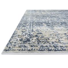 an area rug with blue and beige tones