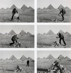 four black and white pictures of men in the desert with pyramids in the background