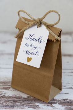 a brown paper bag with a tag that says thanks for being so sweet