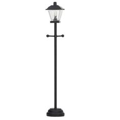 a black lamp post with a light on it's top and two lights on the bottom