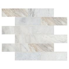 a white marble tile pattern on a wall