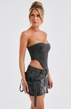 Do double denim to perfection with the Yasie corset and Flor maxi skirt. Our new denim corset is super sleek, made with strapless styling and a cinched fit. 



Colour: Black.

Denim fabric.

Strapless.

Corset shape.

Cropped length.

Model is an XS and is wearing an XS.

 Size: XS, S, M, L, XL, XXL Black Denim Fabric, Homecoming Dresses Corset, White Dress Spring, Long Sleeve Bridesmaid Dress, Long Sleeve Homecoming Dresses, Split Long Dress, Homecoming Dresses Long, Denim Corset, Strapless Corset