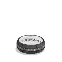 a black and white ring with the word yurman on it's side