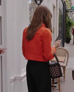 Lily Collins Emily In Paris Orange Jacket S03 A comfort show for many, Emily in Paris has become a key part of the pop culture and fashion community, receiving praise for its engaging storyline, sweet protagonist, amazing characters, and most of all, the high-end style. Focusing the story of Lily Collins as she navigates her life in France for a job deeply resonates with viewers who have experienced similar circumstances, making it a relatable watch in certain aspects. Exude fun and fashionable vibes with AlexGear Emily in Paris orange jacket adorned by Lily Collins in season 3, episode 3 of the series. A bold outerwear made for those who are experimental and daring with their style, this jacket features a cropped silhouette and is perfect for style enthusiasts seeking attire with urban al Fashion-forward Long Sleeve Outerwear For Fall, Fashion-forward Long Sleeve Workwear Outerwear, Fashion-forward Long Sleeve Outerwear For Work, Collarless Leather Jacket, Red Jacket Leather, Celebrity Inspired Outfits, Blue Leather Jacket, Santa Costume, Orange Jacket