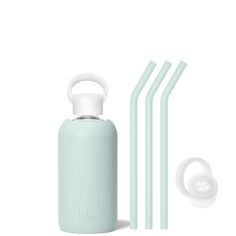 three drinking straws and a bottle with the lid down, next to it is a set of four reusable drinking straws