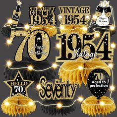 70th birthday decorations with golden ribbons and stars on a black background for an anniversary party